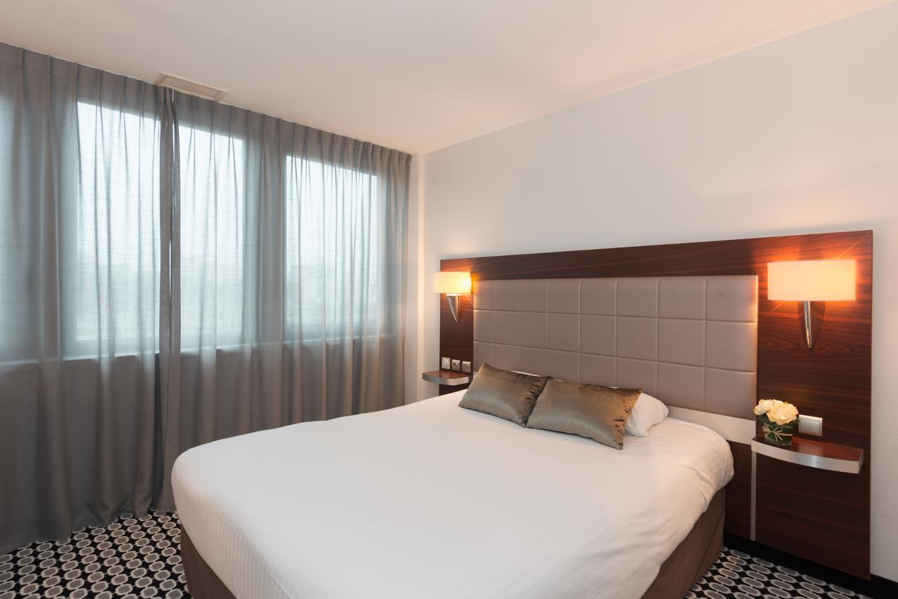 Kyriad Limoges Centre Gare - Atrium Room photo